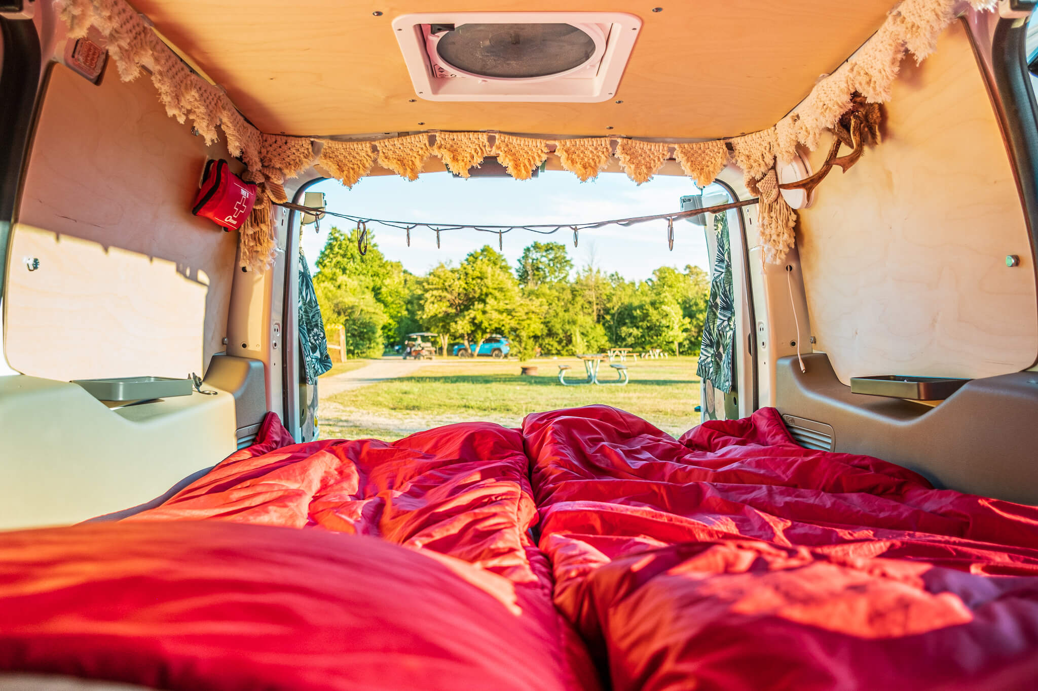 Inside our DIY camper van in sleeping mode