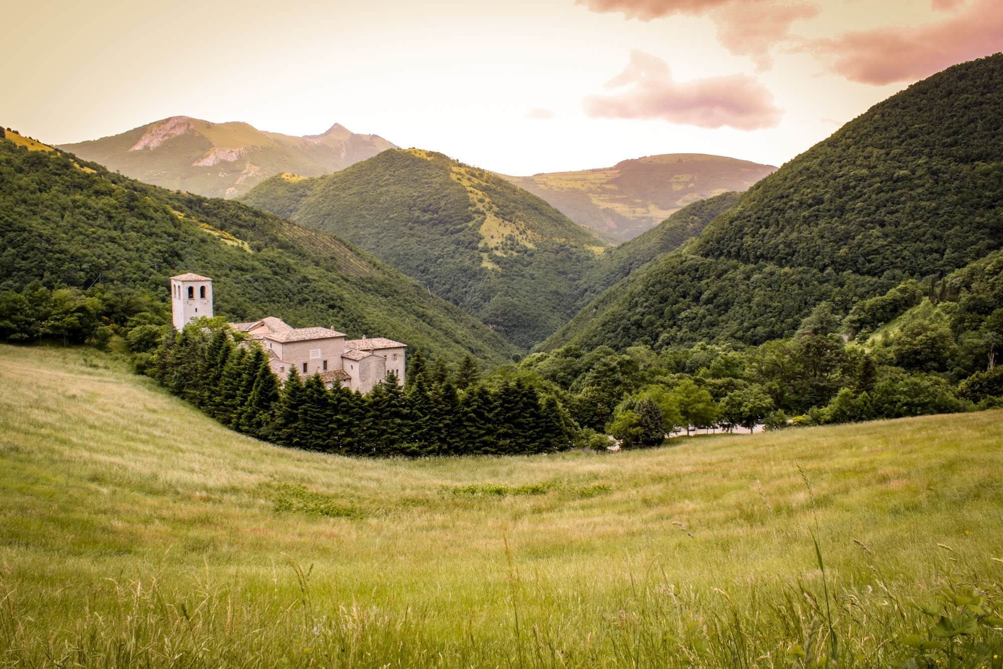 The Fonte Avellana Monastery nestled between the hills in Le Marche, Italy