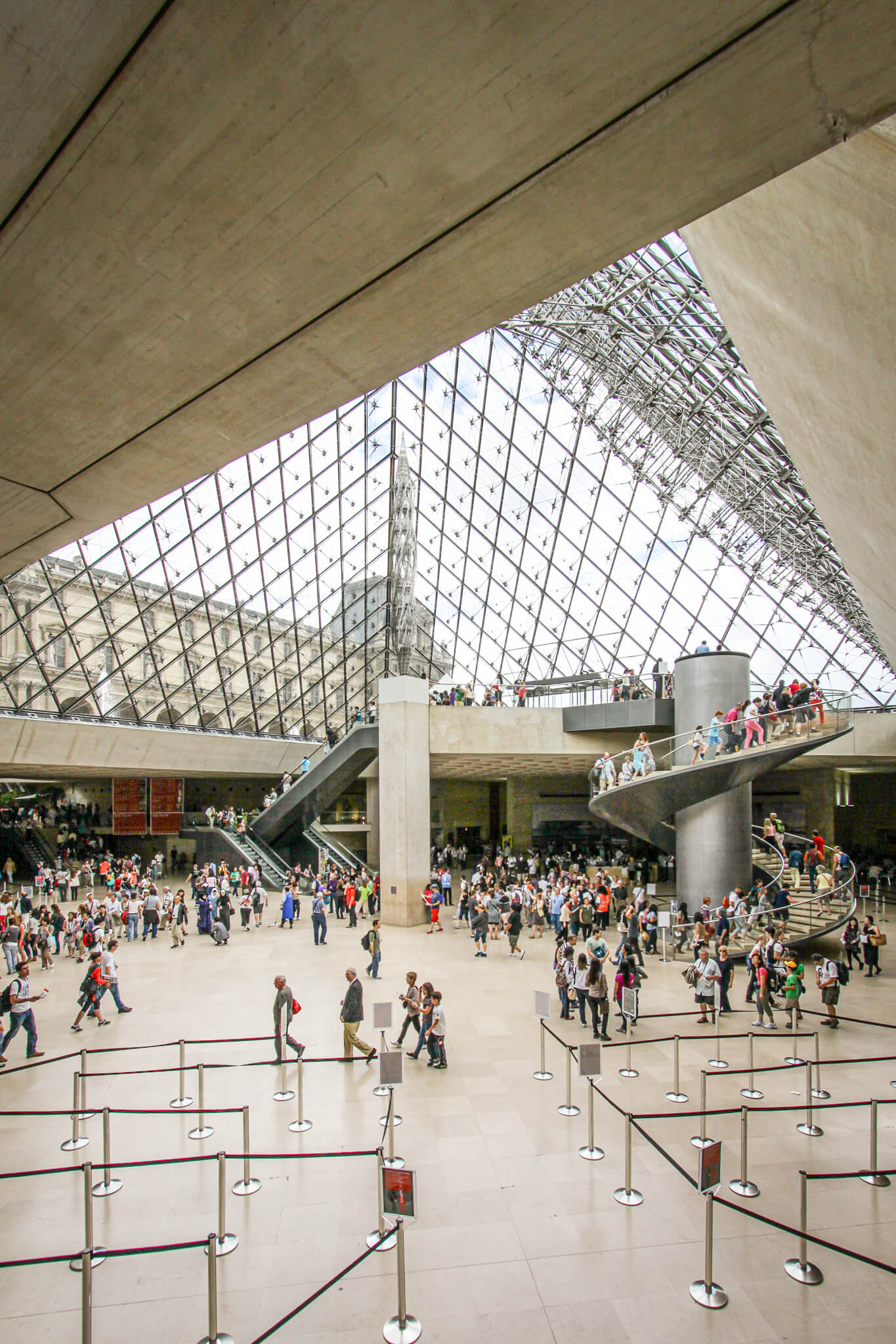 The interior of the glass pyramid at the Louvre