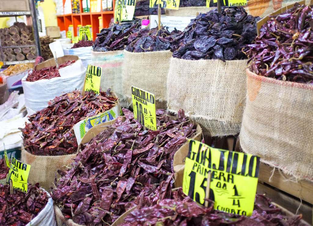 Endless dried chilis at La Merced market