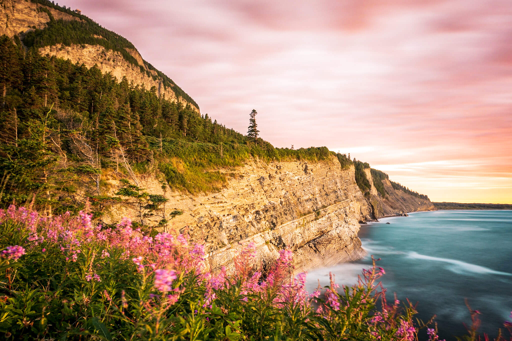 The cliffs at Cap-Bon-Ami reflecting the warm light of sunrise