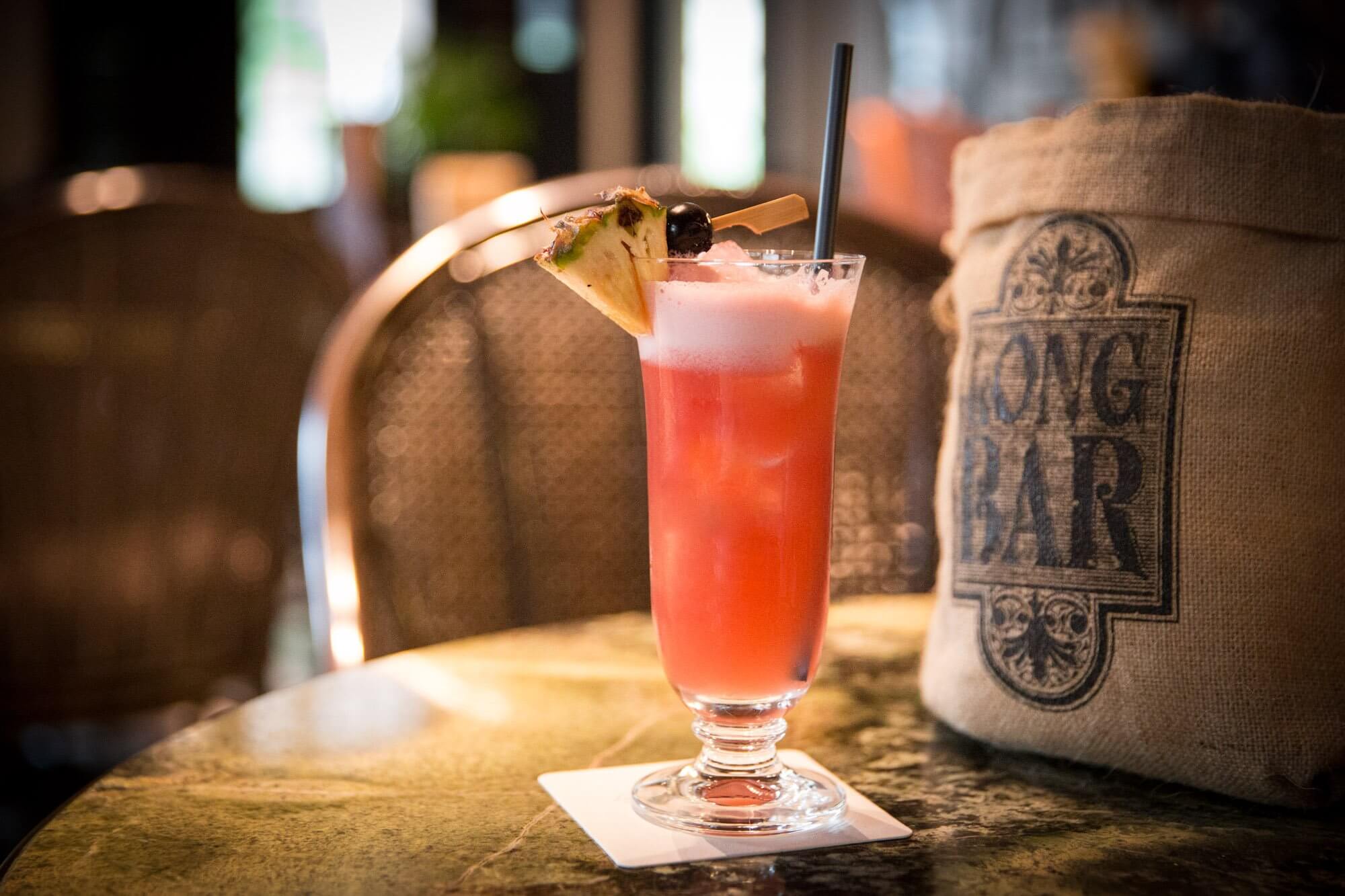 An original Singapore Sling at the Raffles Hotel Long Bar where the cocktail was invented