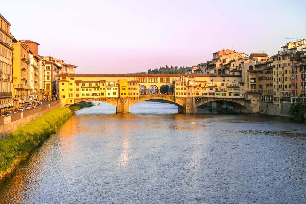 The Ponte Vecchio bridge crossing the Arno river in Florence, Italy