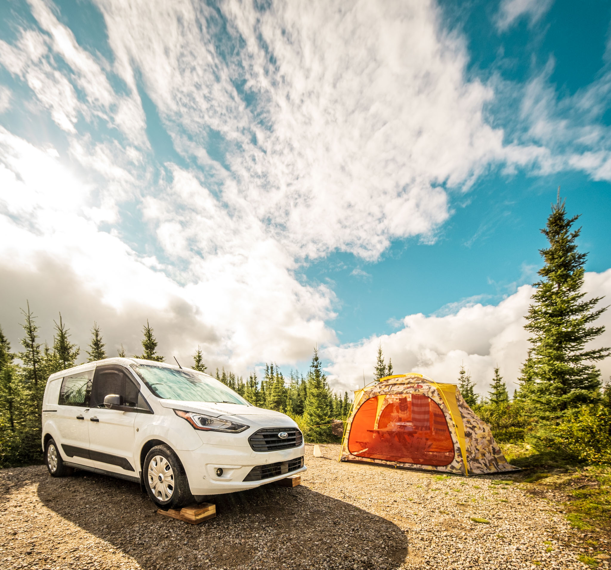 Ford Transit Connect camper van and bug shelter at the Arthabaska campground at Parc national des Grands-Jardins