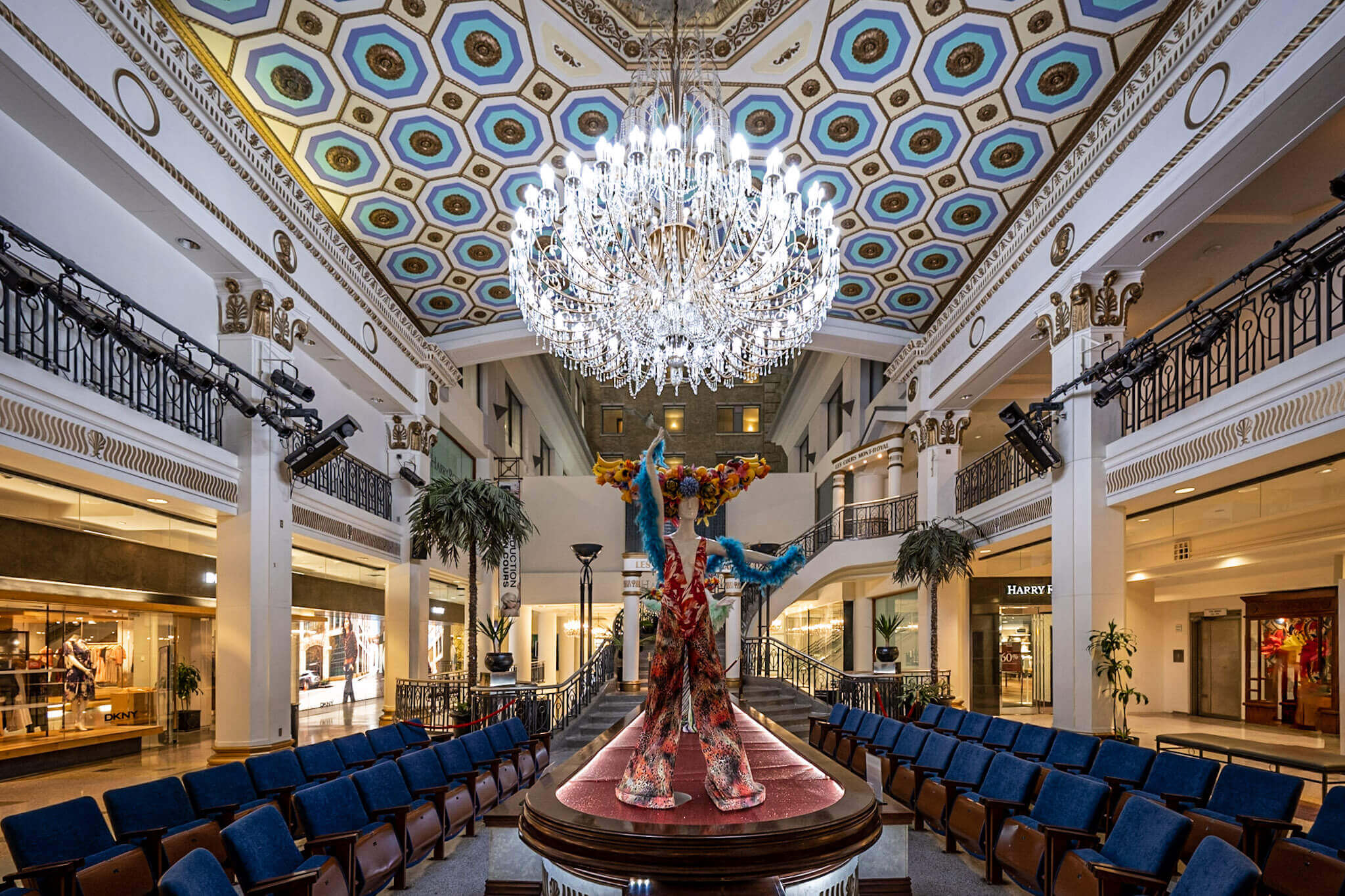 The former hotel lobby and grand chandelier in Les Cours Mont-Royal