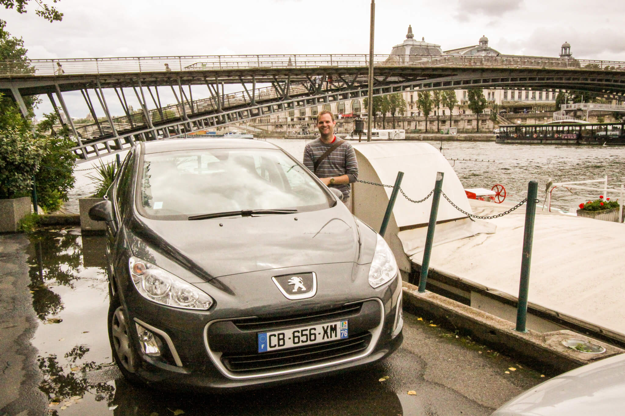 Bringing our rental car down to our houseboat on the Seine River in Paris