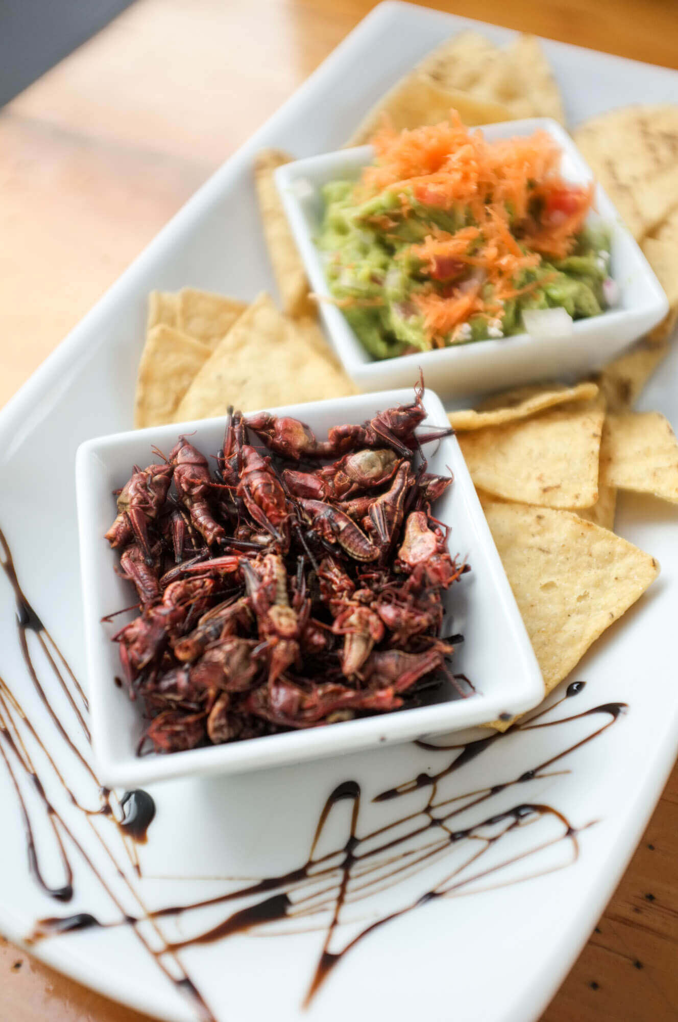 Chapulines (grasshoppers) with guacamole and tortilla chips at Bar El Mexicano in Mexico City