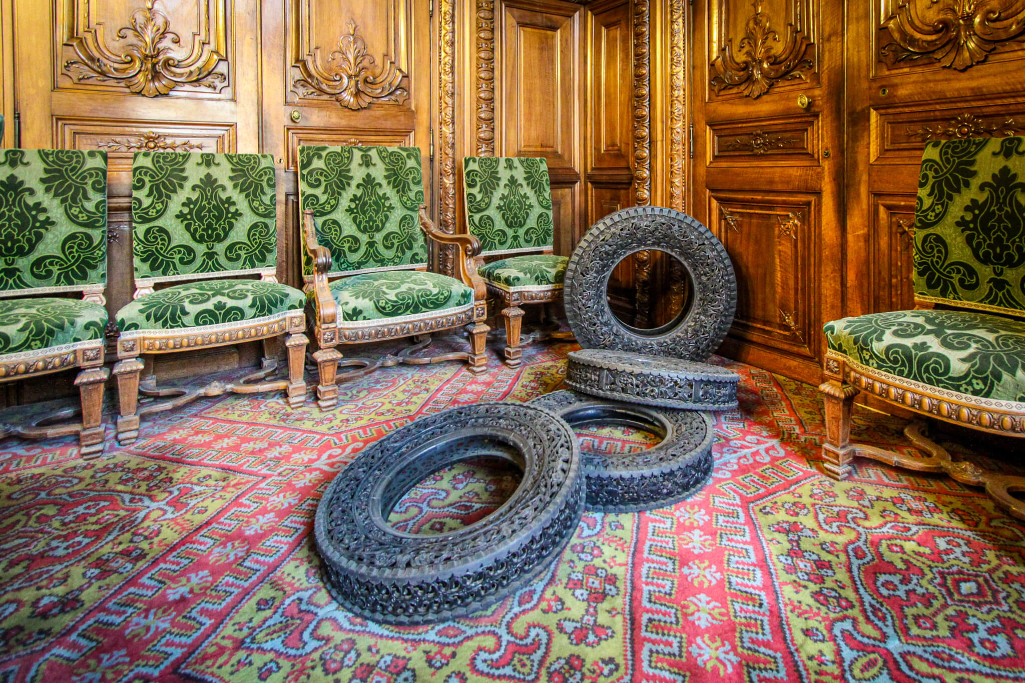 Ornately carved tires featured in a temporary exhibit at the Louvre