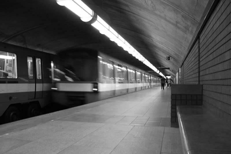 Côte-Vertu subway station interior with 2 trains in station